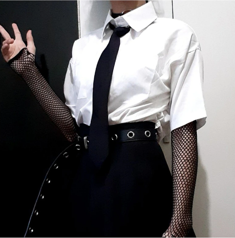 Top view of Femzai's white blouse, highlighting the quality fabric and stylish cut perfect for femboy outfits.