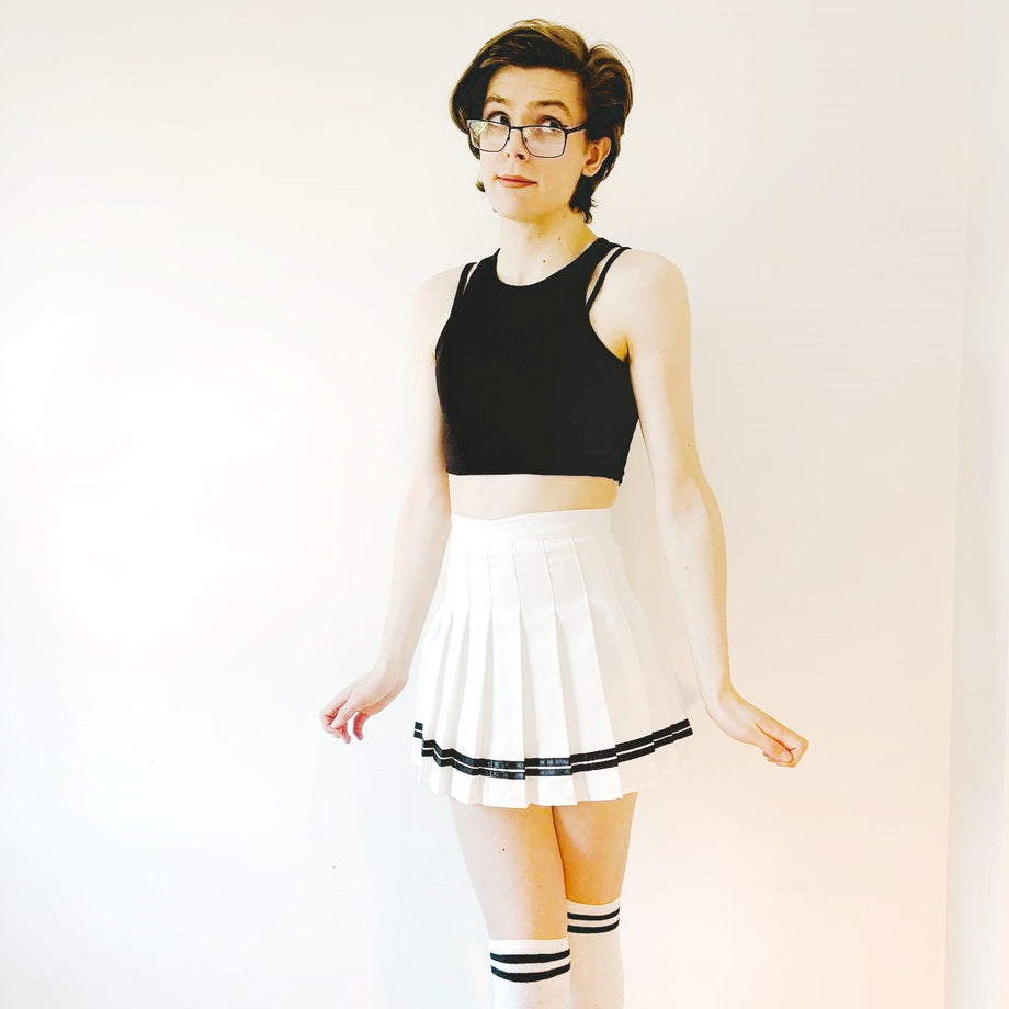 Pleated black and outlet white striped mini skirt