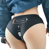 Model showcasing Femzai Please Charge black panties, emphasizing the playful embroidery and comfortable fit.