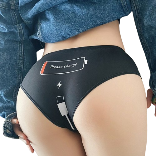 Model showcasing Femzai Please Charge black panties, emphasizing the playful embroidery and comfortable fit.