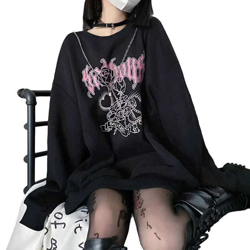 Close-up front view of the black Rose & Brass Knuckle Long Sleeve, showcasing detailed design, ideal for femboy clothing enthusiasts.