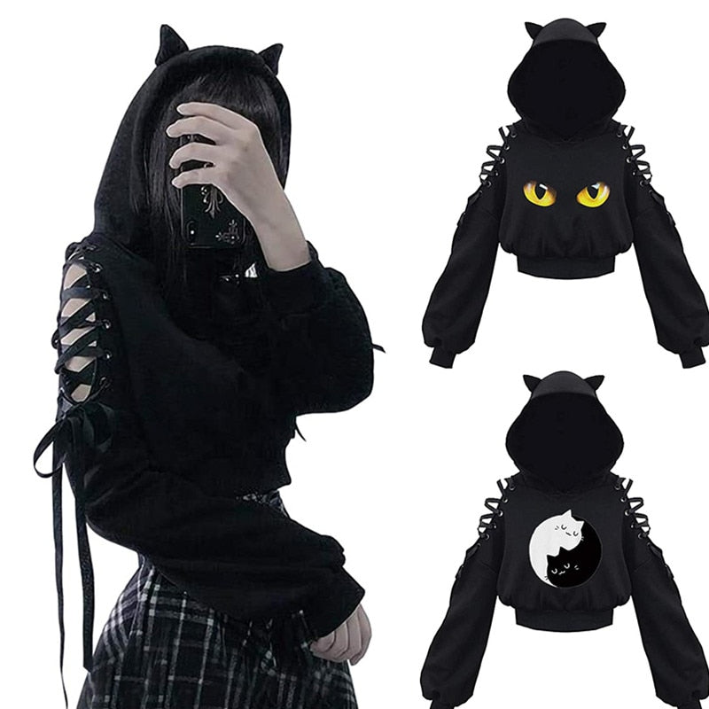 Close-up front view of Femzai's black cut-shoulder cat-ear hoodie, highlighting its trendy off-shoulder design and cute cat ear details.