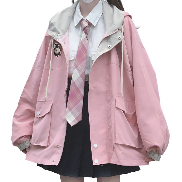 Pink Femzai Bear-Print Zip-Up Jacket, featuring a playful bear print design, cozy fabric, and practical front pockets, offering a stylish and warm femboy clothing option.