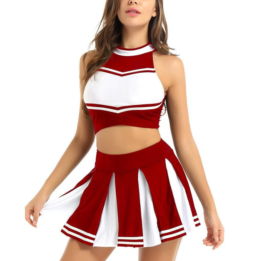 Close-up view of a red and white cheerleader skirt set, a playful addition to Femzai's femboy clothing collection. The top's high neckline and bold stripes are matched with a flared skirt, both capturing the spirit of classic cheer attire.
