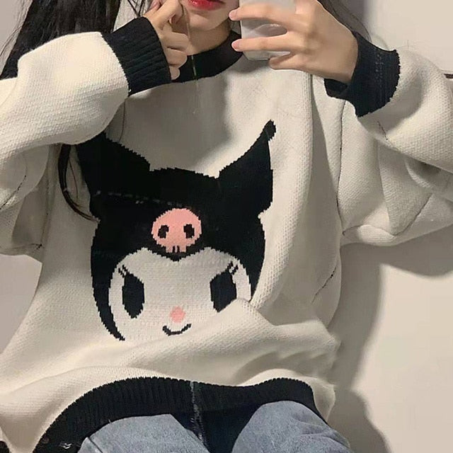 Model presenting the Femzai sweater with a Kuromi design, offering a slightly edgy yet cute aesthetic in femboy outfits, front view.