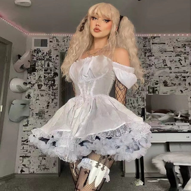Front view of a model wearing the Femzai Puff Sleeve Goth Dress in white, showcasing the dramatic puff sleeves and elegant A-line silhouette, a stylish piece in femboy attire.