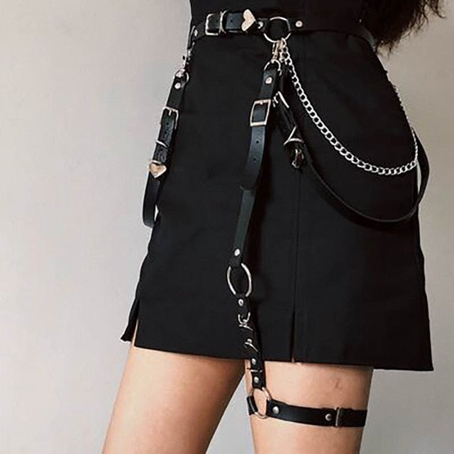 Side view of Femzai's White Leather Chain Leg Ring, a chic and edgy accessory for femboy outfits.