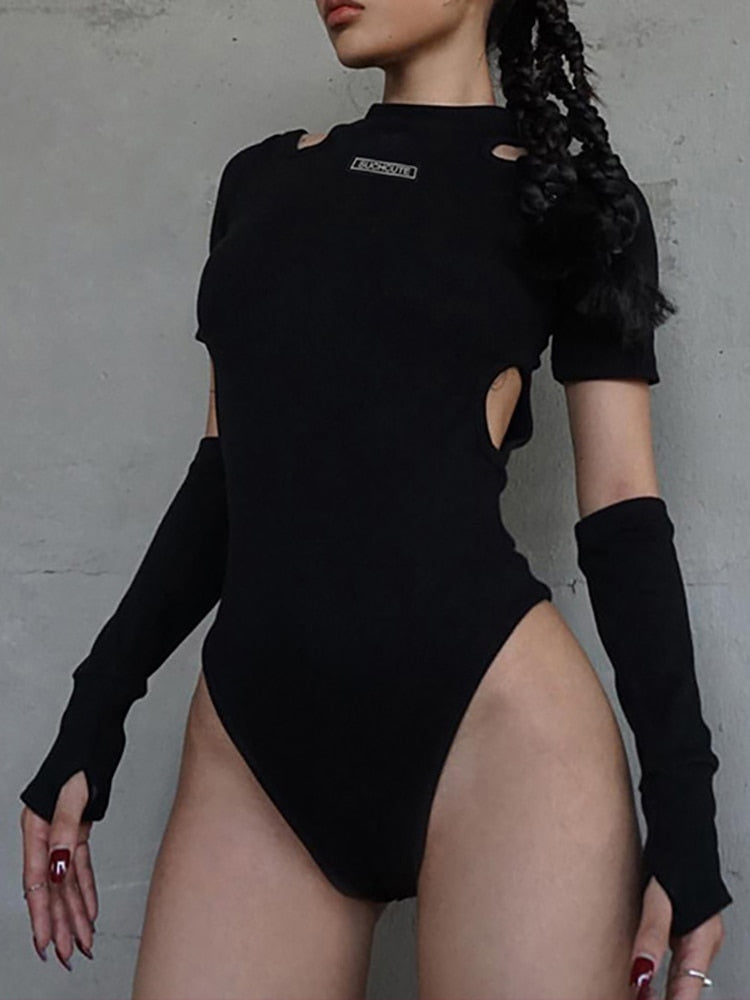 Frontal close-up view of a female model wearing the Femzai bodysuit, a prime example of femboy outfits that highlight design and fit