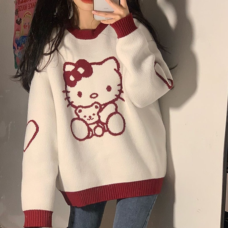 Femzai sweater featuring the iconic Hello Kitty design, modeled in a front view, adding a charming and nostalgic touch to femboy clothing.