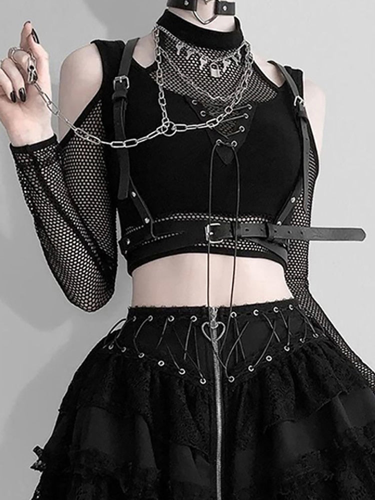 Close-up front view of a black edgy crop-top from the Femzai femboy clothing line, showcased on a faceless model against a pristine white background.