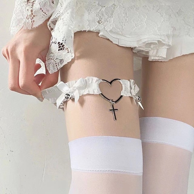 Close-up view of a model's thighs adorned with Femzai's Lace Bow Knot Leg Rings in elegant white, highlighting the delicate lace and charming bow knot design, a sophisticated and sensual accessory enhancing femboy outfits and attire with its premium, adjustable comfort.