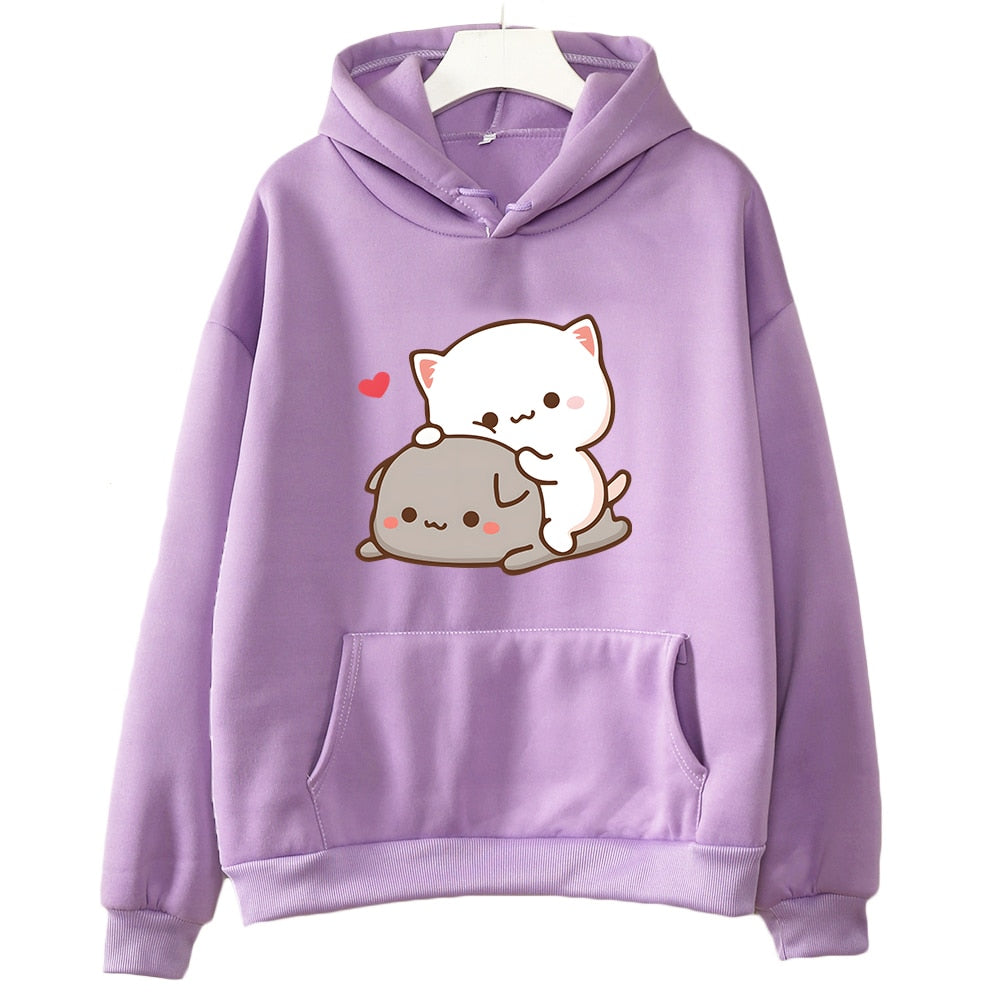 Close-up view of a Femzai purple hoodie featuring the adorable Peach & Goma cat design, perfect for femboy clothing enthusiasts seeking a cute and playful look. The front view highlights the soft lavender hue and the large graphic of two snuggling cartoon cats with a small red heart, set against a simple white background to emphasize the design details.