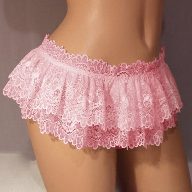 Front view semi close-up of Femzai's pink Sissy Lace Mini Skirt, displaying the elegant lace detail, a charming addition to any femboy outfit.